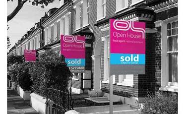 Open House sales boards outside of sold properties