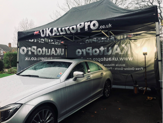 UK Auto Pro car tent with customers car being tinted