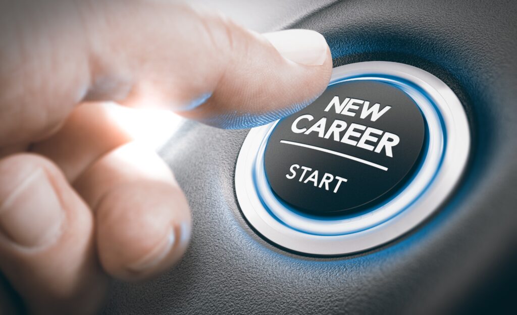 finger pressing a button saying 'new career-start'
