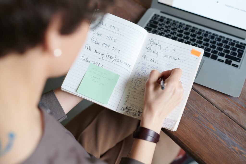 woman writing in her diary