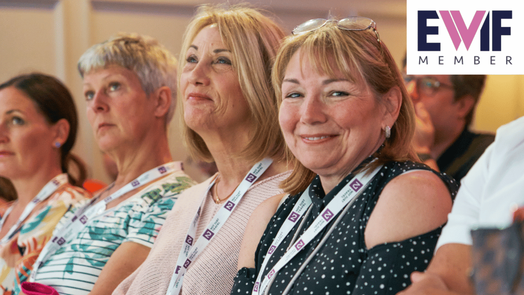 group of women smiling at an Ewif conference